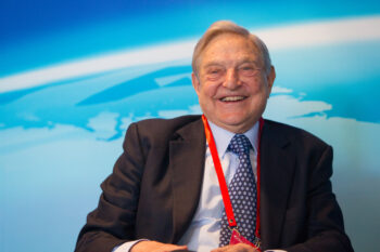 --FILE--Billionaire investor George Soros, chairman of Soros Fund Management and founder of The Open Society Institute, reacts at a sub-forum during the Boao Forum for Asia Annual Conference 2013 in Qionghai city, south China's Hainan province, 8 April 2013.

China's state media has warned billionaire investor George Soros against betting on falls in the value of the Chinese yuan and Hong Kong dollar amid widespread worries over the health of the world's second-largest economy. China's fourth-quarter economic growth slowed to the weakest since the global financial crisis, increasing pressure on a government struggling to regain investors' confidence after perceived policy missteps jolted global markets. "Soros' challenge against the renminbi (yuan) and Hong Kong dollar is unlikely to succeed, there is no doubt about that," the People's Daily overseas edition said in a front-page opinion piece on Tuesday (26 January 2016). China's economic fundamentals remain sound, despite slower growth, volatility in its stock market and the yuan's depreciation against the U.S. dollar, said the opinion piece, written by a researcher at the commerce ministry.