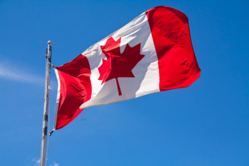 A Canada flag flapping in the wind